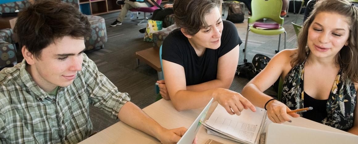 Professor Moon Duchin working with students