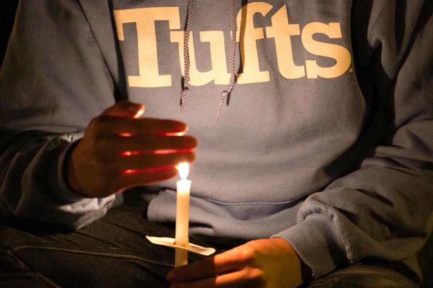 Student holding candle